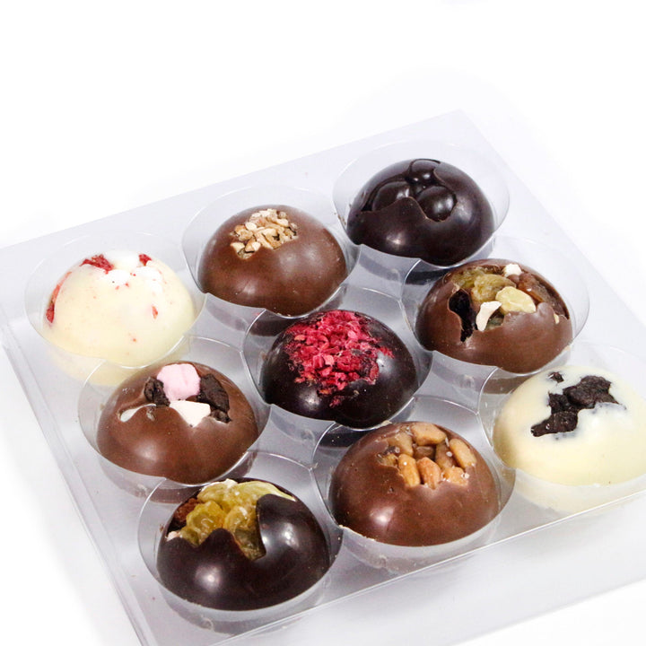 Box of assorted chocolates from The Cambridge Confectionery Company 160g Box of 9 Solid Domes
