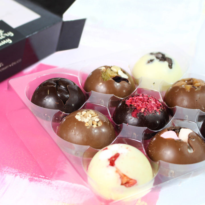 Box of assorted chocolates from The Cambridge Confectionery Company 160g Box of 9 Solid Domes